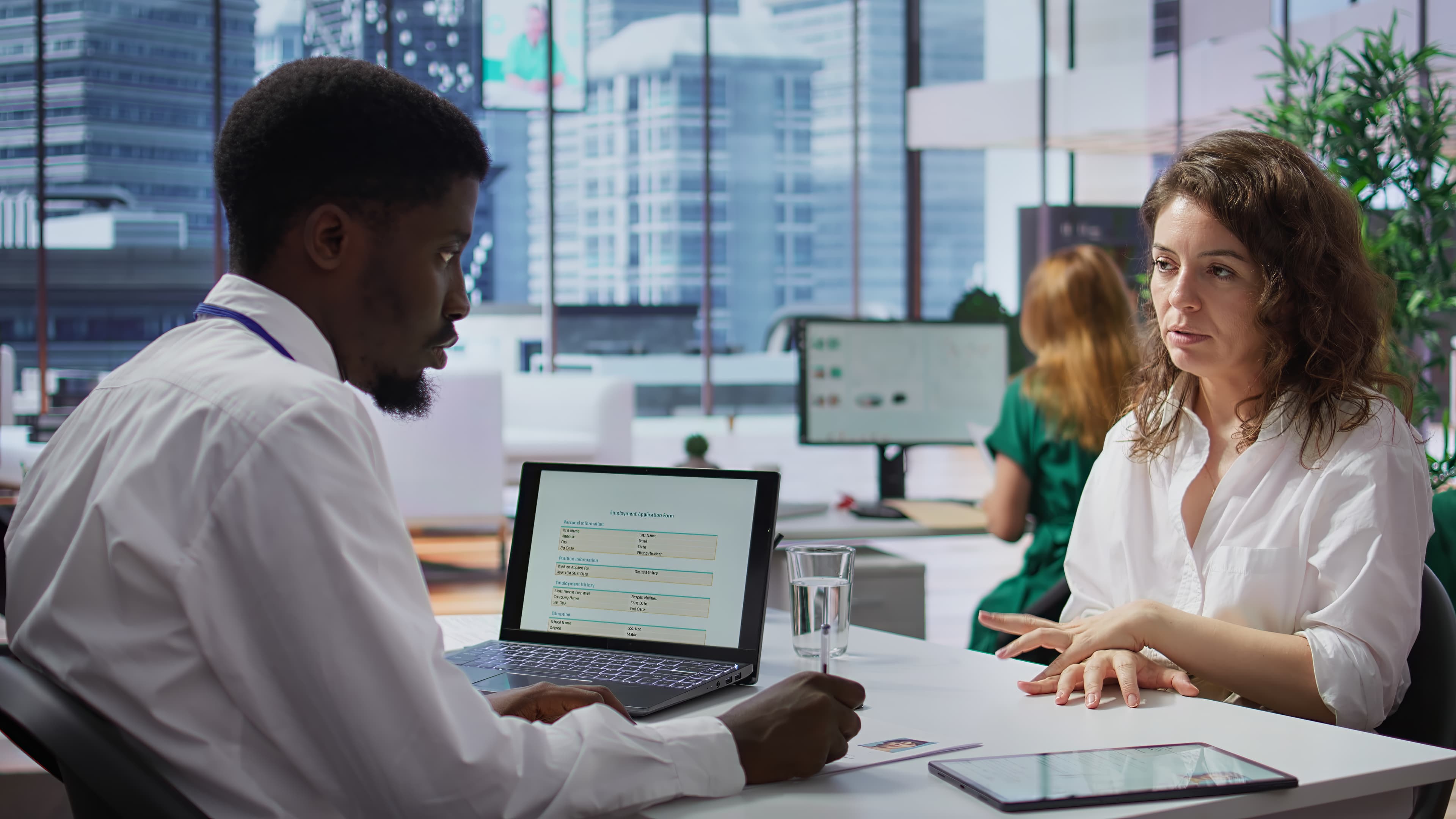 Connect Outsourcing consultants meeting with a client